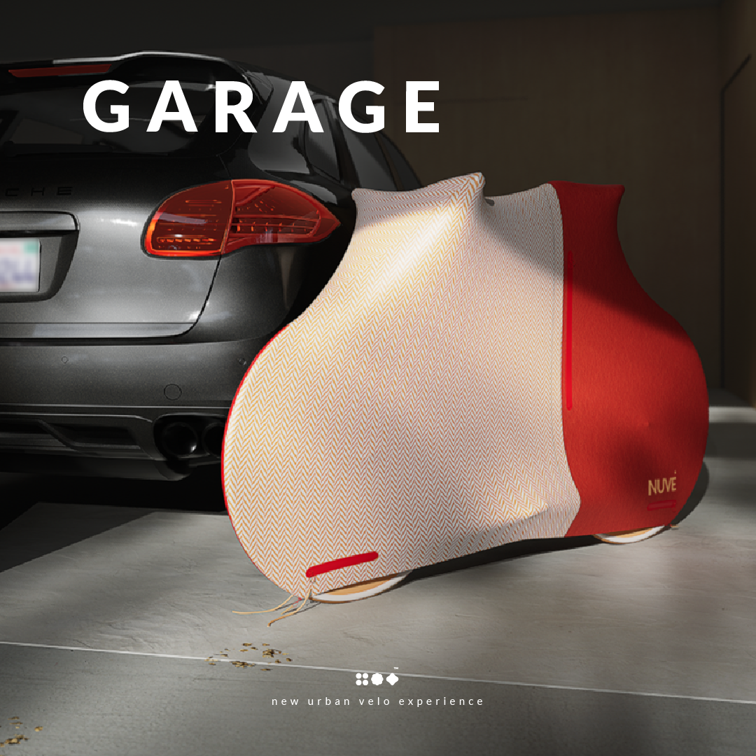 Nuve NX1 protective gear in Hackney Wool colour range, red and herringbone two-tone, in a garage background.