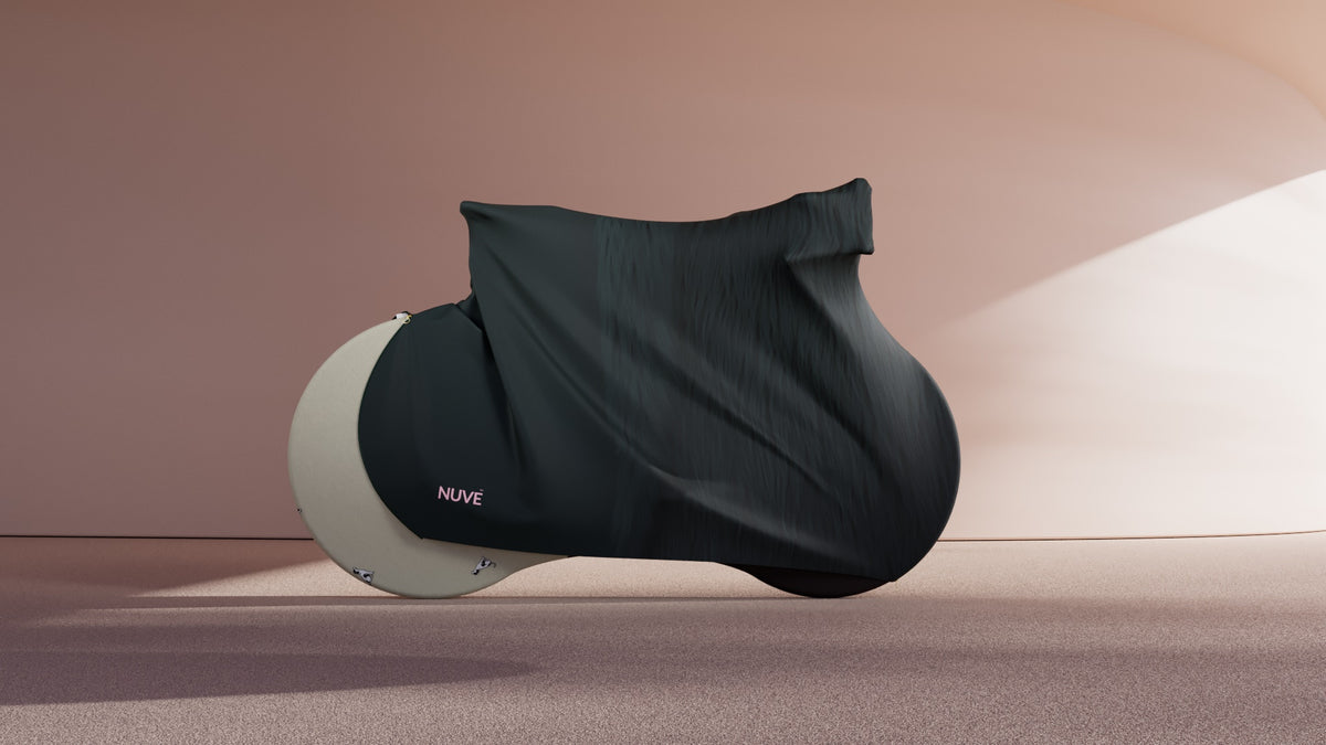 Nuve NX1 protective gear in Mayfair Fur colour range, dark green leather and Fur, installed on top of Nuve NX2 protective gear in Hackney Pistachio colour range, pistachio green and black brown fur texture in a pink architectural background.